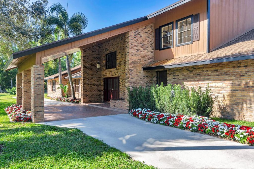 Photo of 13677 Caloosa Boulevard, Palm Beach Gardens, FL 33418 (MLS # R11039731)