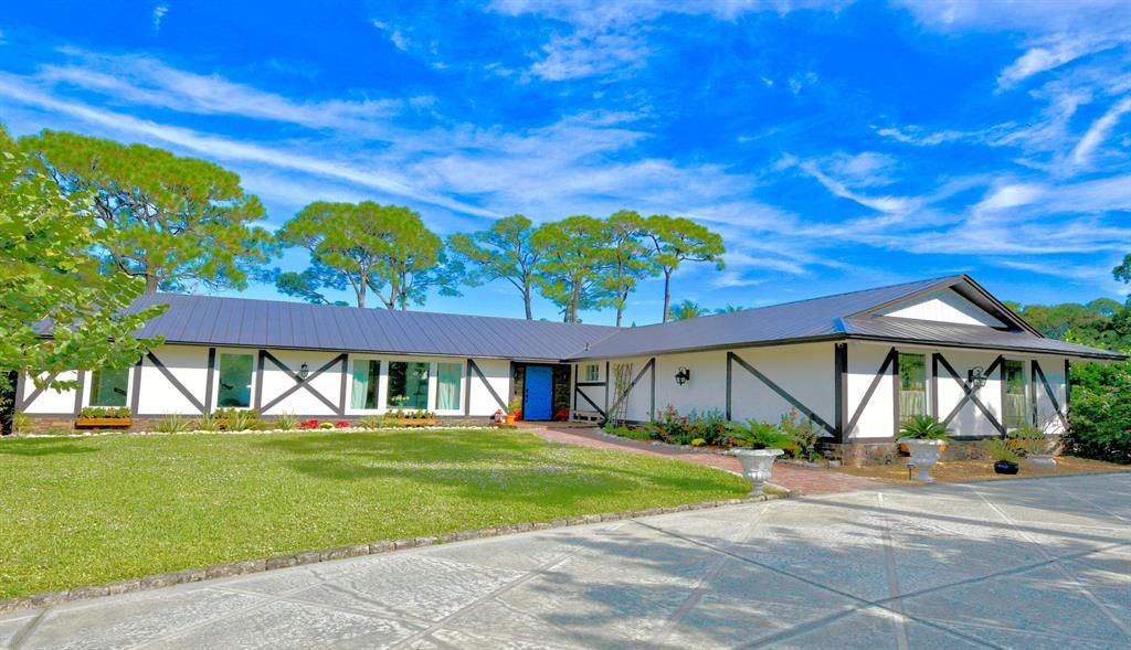 Photo of 5699 Shirley Drive, Jupiter, FL 33458 (MLS # R10763923)