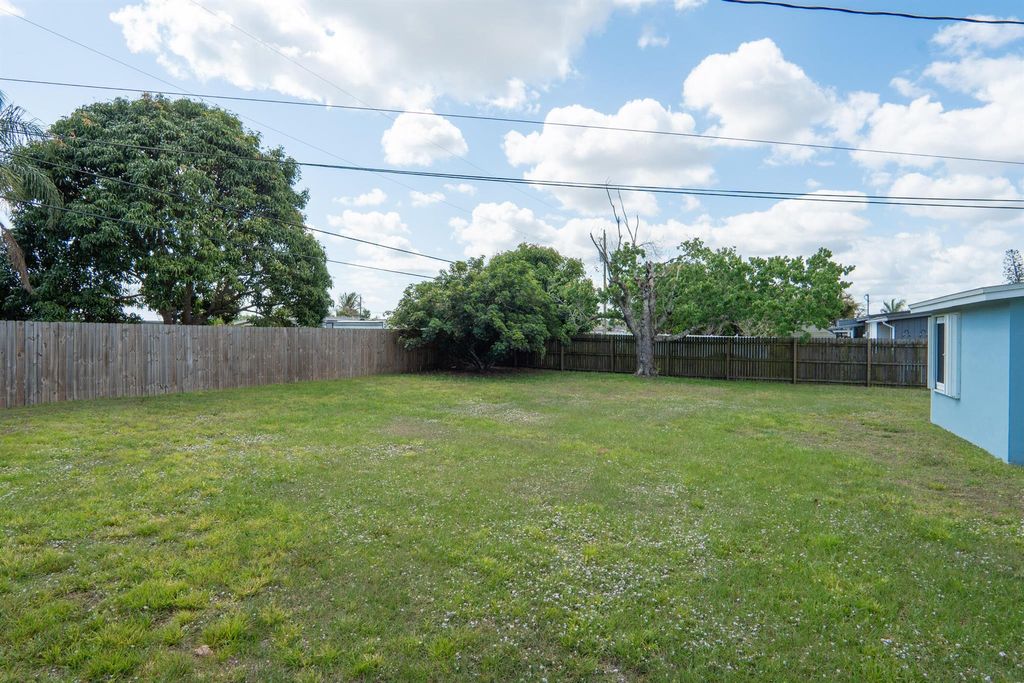 Photo of 435 SE Airoso Boulevard, Port Saint Lucie, FL 34983 (MLS # R11084304)