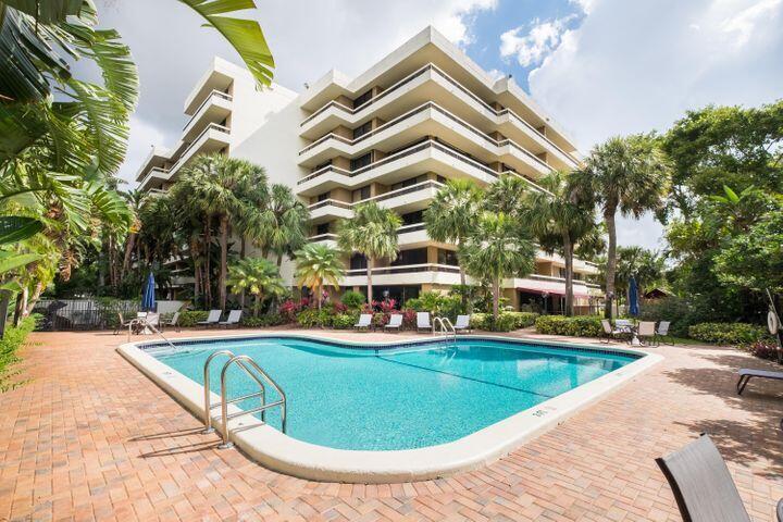 Gorgeous 5th floor renovated 2 bedroom, 2 bath condo in La Residence at Boca Del Mar. Light and bright, with an expanded kitchen that boasts wood cabinets, stainless steel appliances and granite counters. Customer tile throughout. Crown Molding throughout with Newer light fixtures and full size washer and dryer with interior laundry room. From the 5th floor, you have expansive garden views and balmy breezes from your wrap around balcony. Boutique building with Pool, Clubroom and Gym. Gorgeous atrium reminiscent of morocco with lavish fountains and lush landscaping. Close to Shopping, restaurants, A rated schools, I95, Turnpike, the famous Boca town center mall and only a few minutes from trendy Mizner Park and Downtown Boca and all of its best beaches. Local responsible Owner.