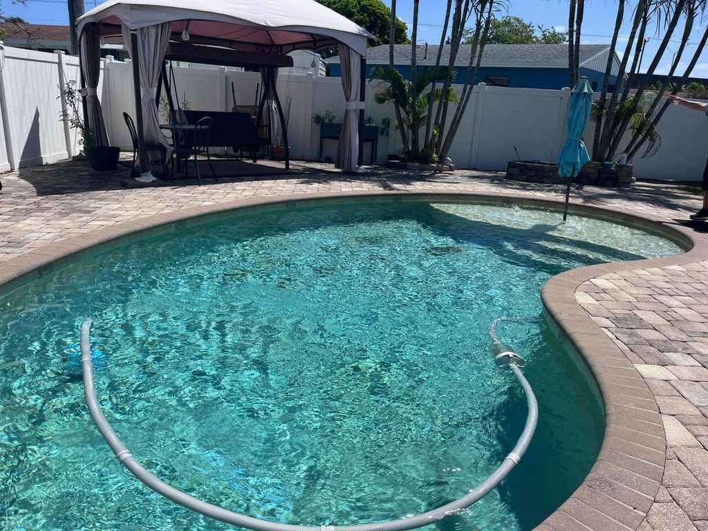 Photo of 9342 Bloomfield Drive, Palm Beach Gardens, FL 33410 (MLS # B26013500)