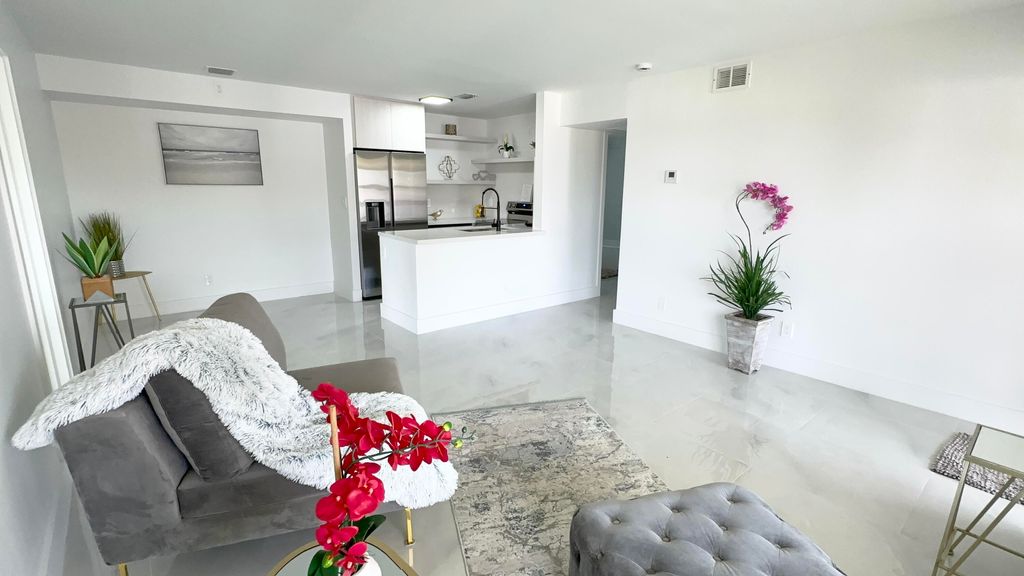 Photo of 10033 Winding Lake Road #204, Sunrise, FL 33351 (MLS # B26002196)