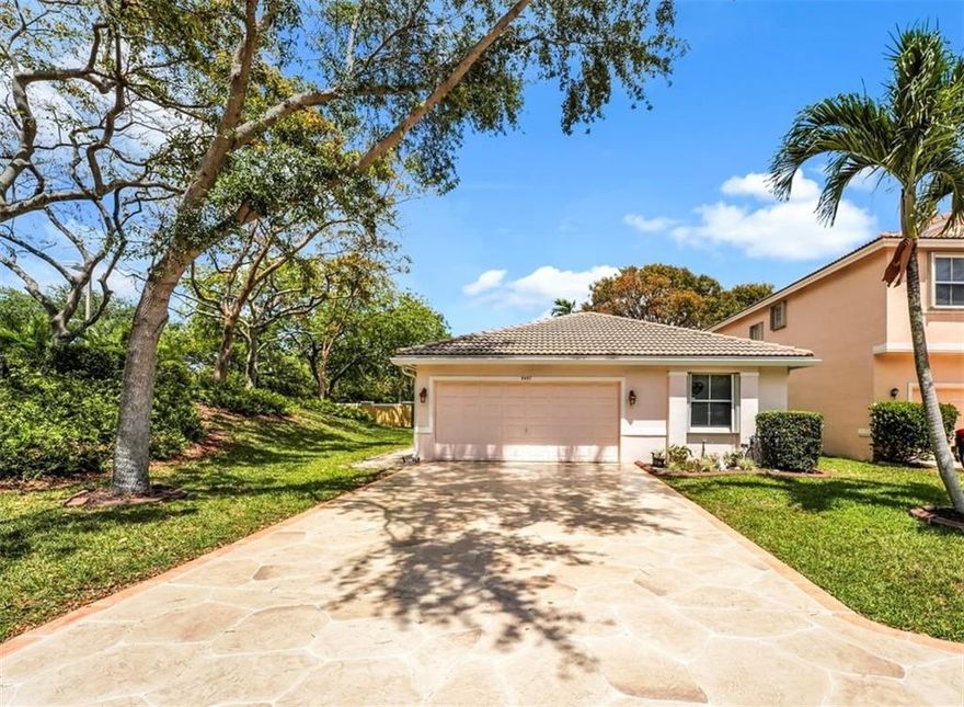 Welcome to Lake Windermere community, part of Indigo Lakes in Coconut Creek. This Beautiful 3 bed 2 bath home with a Flex room, that can be easily customized and virtually used for anything. This home is in immaculate condition and move in ready. The property boasts an amazing over-sized driveway, with plenty of space for parking. Home includes Hurricane Accordion Shutters, Upgraded kitchen and bathrooms. Tile flooring all through out. Corner lot. Gated community, with community pool, gym and low HOA. Coconut Creek is surrounded by great schools, parks, easy access to Sawgrass Expressway & other major highways. Close to Shopping, Dinning, Entertainment and family fun! Roof is Original. 1997 yr.Water Heater 2014. AC unit & handler 2014. Thermostat 2014. Electrical Panel is GE. Hurricane Accordion Shutters on windows & doors. Front door & Garage door are Hurricane Impact. All decorative curtain rods, including Primary bedroom, formal living room & Flex Room/ Den/office Do Not Convey.