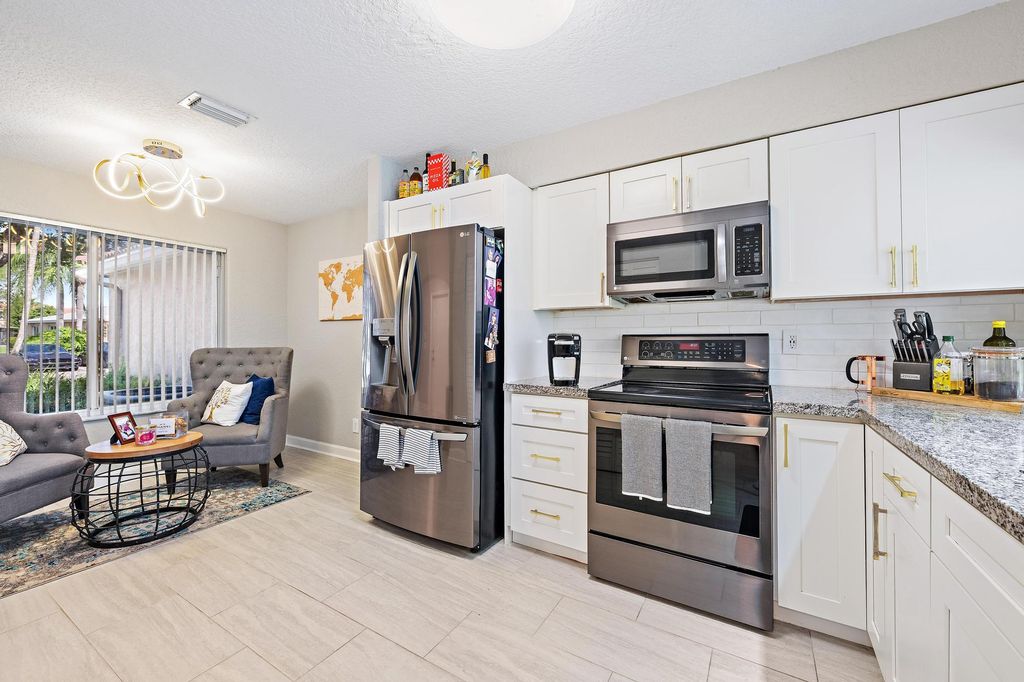 Photo of 1734 SW 109th Terrace #1734, Davie, FL 33324 (MLS # B26026115)