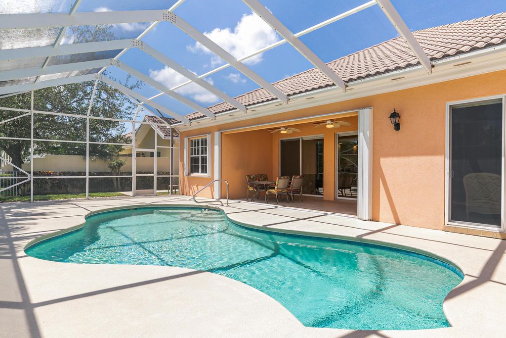 Photo of 10915 SW Hartwick Drive, Port Saint Lucie, FL 34987 (MLS # R11071280)