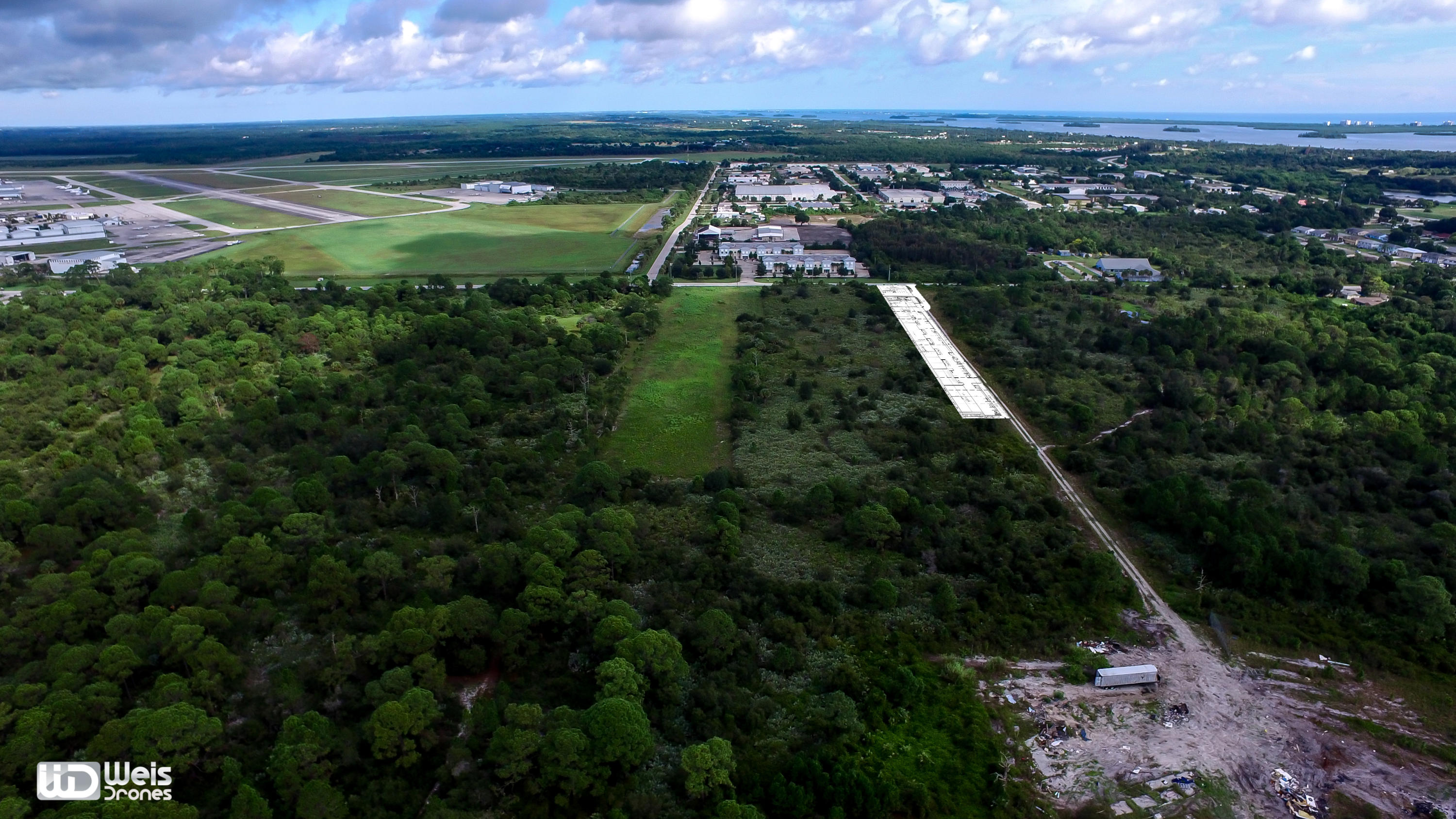 2.25 Acres zoned Industrial Light almost across from the Treasure Coast International Airport and Business Park located between Vero Beach and West Palm Beach with tremendous access to highway, rail or port for your aviation or non-aviation business .Sale includes Parcel Id:1428-702-0664-000-4 (0.32 Ac)MOTIVATED SELLER!!