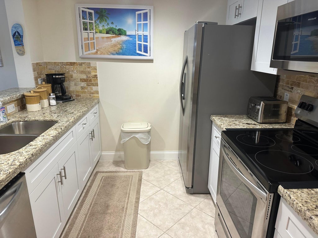 Photo of 600 Scotia Drive #105, Hypoluxo, FL 33462 (MLS # R10925650)