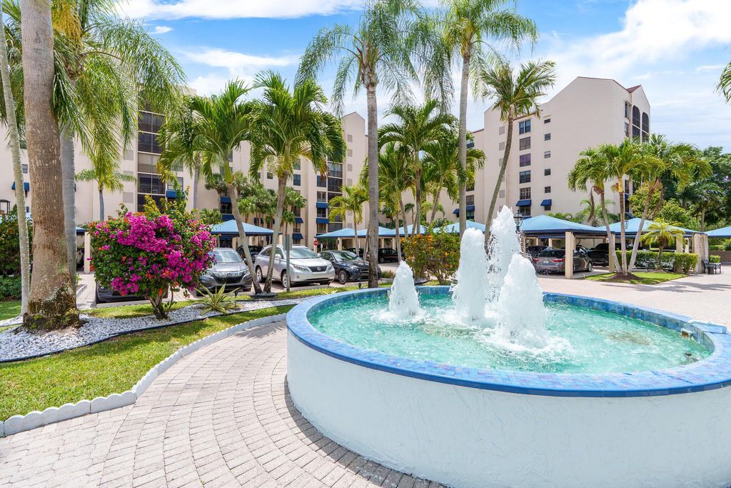 Photo of 7572 Regency Lake Drive #302, Boca Raton, FL 33433 (MLS # R11088373)