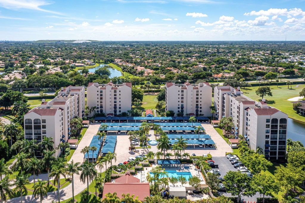 Photo of 7572 Regency Lake Drive #302, Boca Raton, FL 33433 (MLS # R11088373)