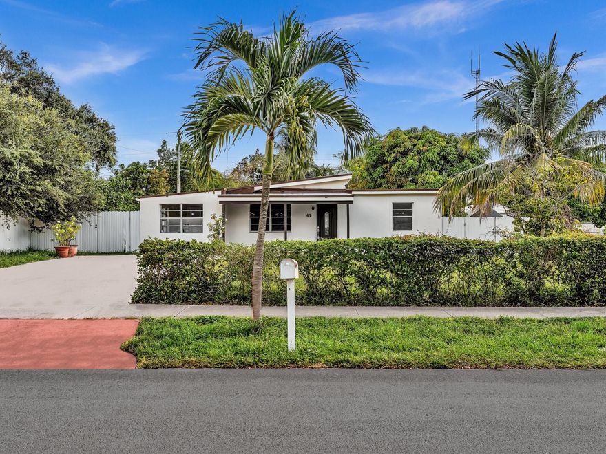 Charming updated 3/2 with separate entry 1/1 multigenerational home in the heart of West Park! Beautifully updated property, ideal for extended families and smart investors alike! Features include modern kitchen areas, an island, with new stainless steel appliances, stylish bedrooms and baths, new flooring, and fresh paint. Tankless water heater. Independent living areas offer family privacy or income potential—perfect for in-laws, guests, or rental use. New 2025 roof and large fenced backyard with mature fruit trees, ideal for entertaining or future additions. Plenty of parking for cars, boat, or RV. Centrally located near major highways, shopping, dining, Hard Rock Casino, and minutes from Hollywood and Hallandale beaches. Just in time for the holidays, a must see, this one wont last!