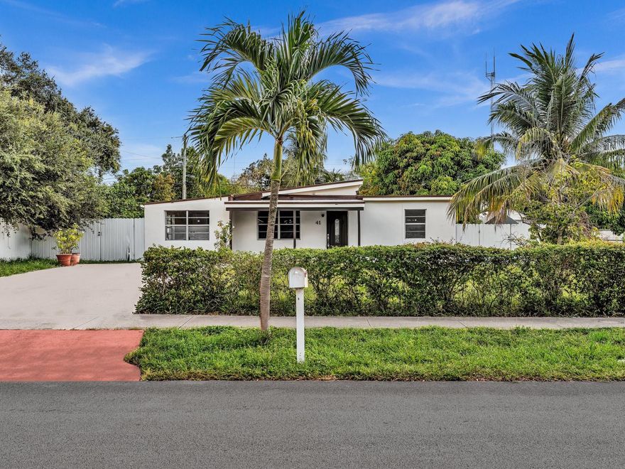 Price improvement! Charming updated 3/2 plus 1/1 with separate entry, multigenerational home in the heart of up and coming West Park! Beautifully updated property, ideal for extended families and smart investors alike! Features include modern kitchen areas, an island. All new stainless steel appliances and washer/dryers. Stylish bedrooms and baths, new flooring, and fresh paint. Tankless water heater. Independent living areas offer family privacy or income potential—perfect for in-laws, guests, or rental use. Brand new 2025 roof and large fenced backyard with mature fruit trees, ideal for entertaining or future additions. Plenty of parking for cars, boat, or RV. Centrally located near major highways, shopping, dining, Hard Rock Casino, and minutes from Hollywood and Hallandale beaches.