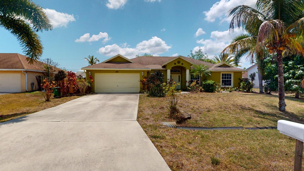 Photo of 744 SW Monsoon Road, Port Saint Lucie, FL 34953 (MLS # R10980222)