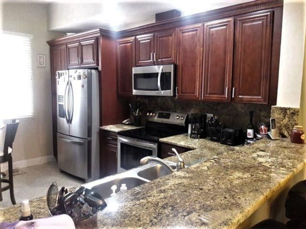 Photo of 27 Harbour Isle Drive Dr W #104, Fort Pierce, FL 34949 (MLS # R10693725)