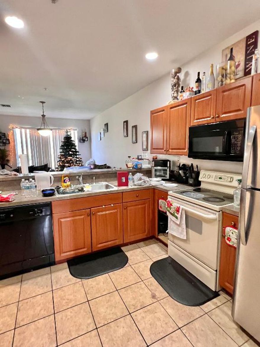 Don't miss this exceptional opportunity to own a spacious 3-bedroom, 2-bathroom condo in the sought-after Marsh Harbour community. Open floor plan and townhouse-style layout, this property is ideal for investors or as your future home.No rental restrictions - Pet-friendly. Low HOA fees - Includes cable and water. Gated community with 24/7 security. Two assigned parking spaces. Prime location - Just minutes from the beach, CityPlace, and PBI Airport. Currently leased to a long-term tenant through October 2026, offering immediate rental income. Priced to sell !