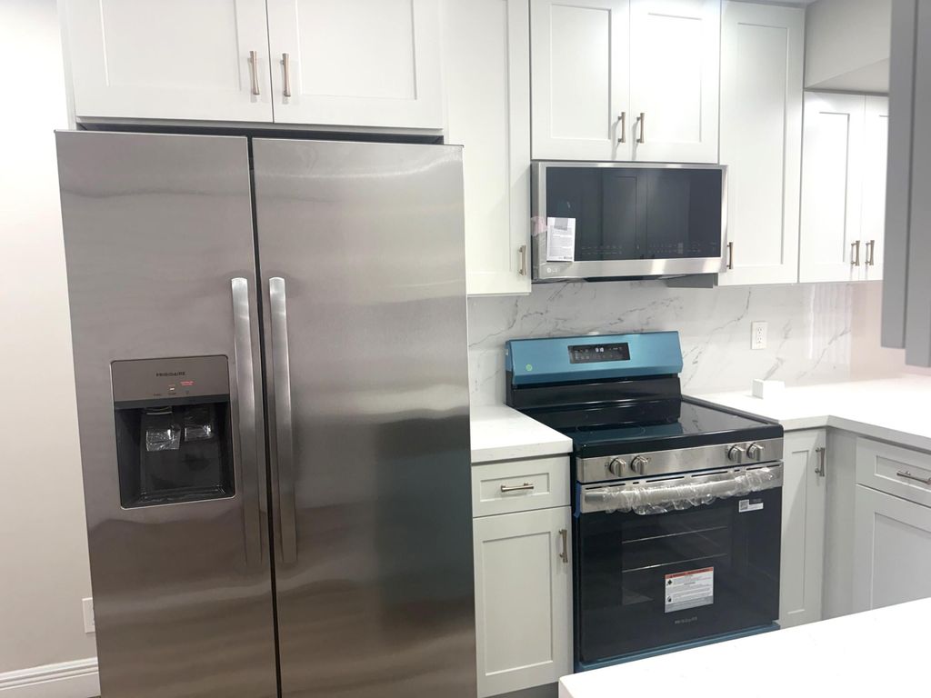 Photo of 9793 Riverside Drive #59-4, Coral Springs, FL 33071 (MLS # B26009271)