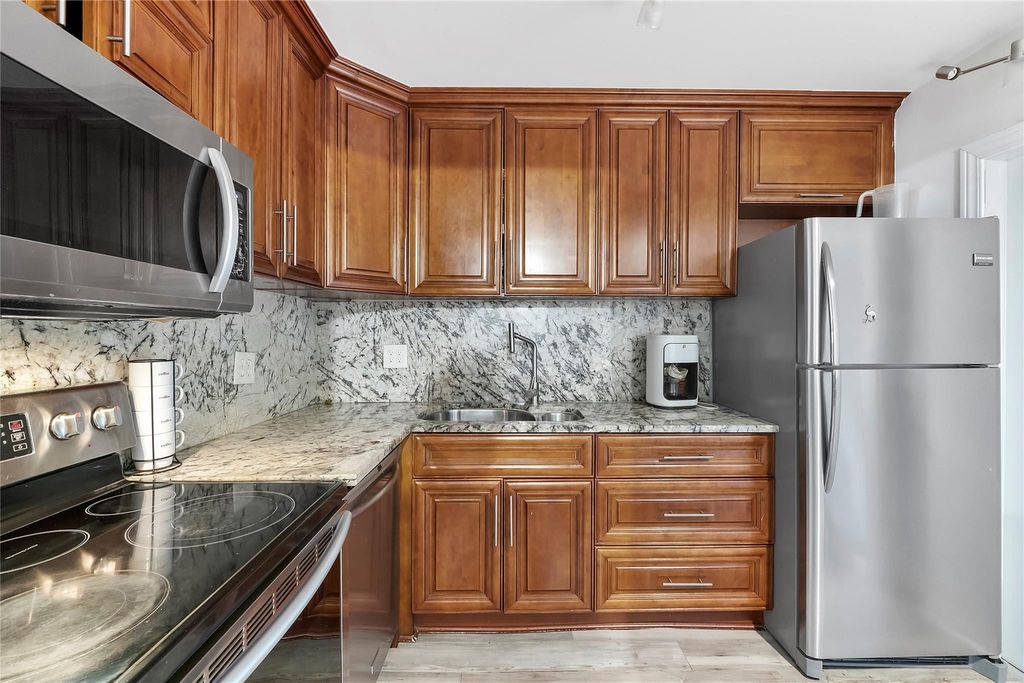 Photo of 1967 S Ocean Boulevard #201, Pompano Beach, FL 33062 (MLS # B26056612)