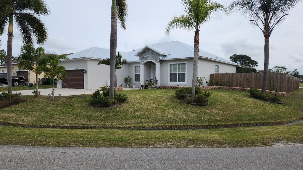 Photo of 1590 SW Wepaco Avenue, Port Saint Lucie, FL 34953 (MLS # R10965034)