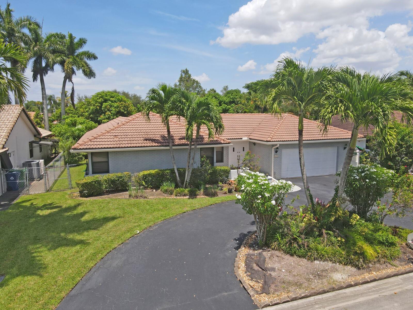 This is your new 4 bedroom, 2 bath, 1-story waterfront pool home with 2-car garage located in the Oakbrook Community of Coral Springs. This house combines comfort, style, and function that makes it a home. It features a backyard oasis with a pool surrounded by an oversized back patio which is the ideal spot for hosting outdoor gatherings or serenity/privacy. The open floor plan boasts a remodeled kitchen (granite tops & stainless appliances), eat in kitchen area, formal dining room, separate laundry room, tile floors, and accordion shutters / impact windows for peace of mind. Close proximity to: A-rated schools (Park Springs Elementary & Fern Glen Middle) and Volunteer & Fern Glen Parks. Shopping/Dining nearby at Sawgrass, The Promenade, Home Depot, Target... What more could you want?