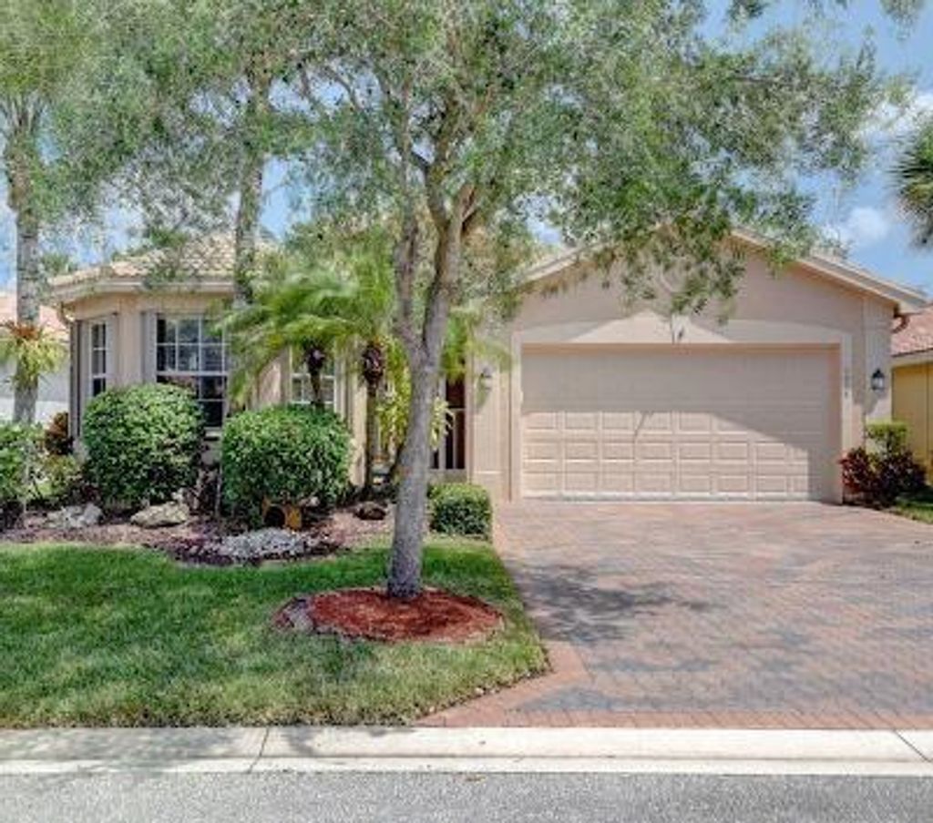 Photo of 7908 Seagrape Shores Drive Dr, Lake Worth Beach, FL 33467 (MLS # R10791630)