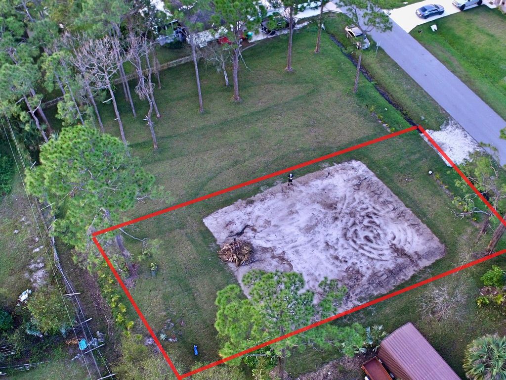 Photo of 7103 Lakeland Boulevard, Fort Pierce, FL 34951 (MLS # R10835304)