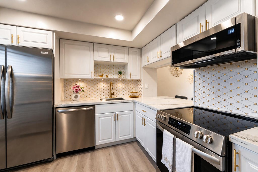 Photo of 9810 Marina Boulevard #1115, Boca Raton, FL 33428 (MLS # B26050222)