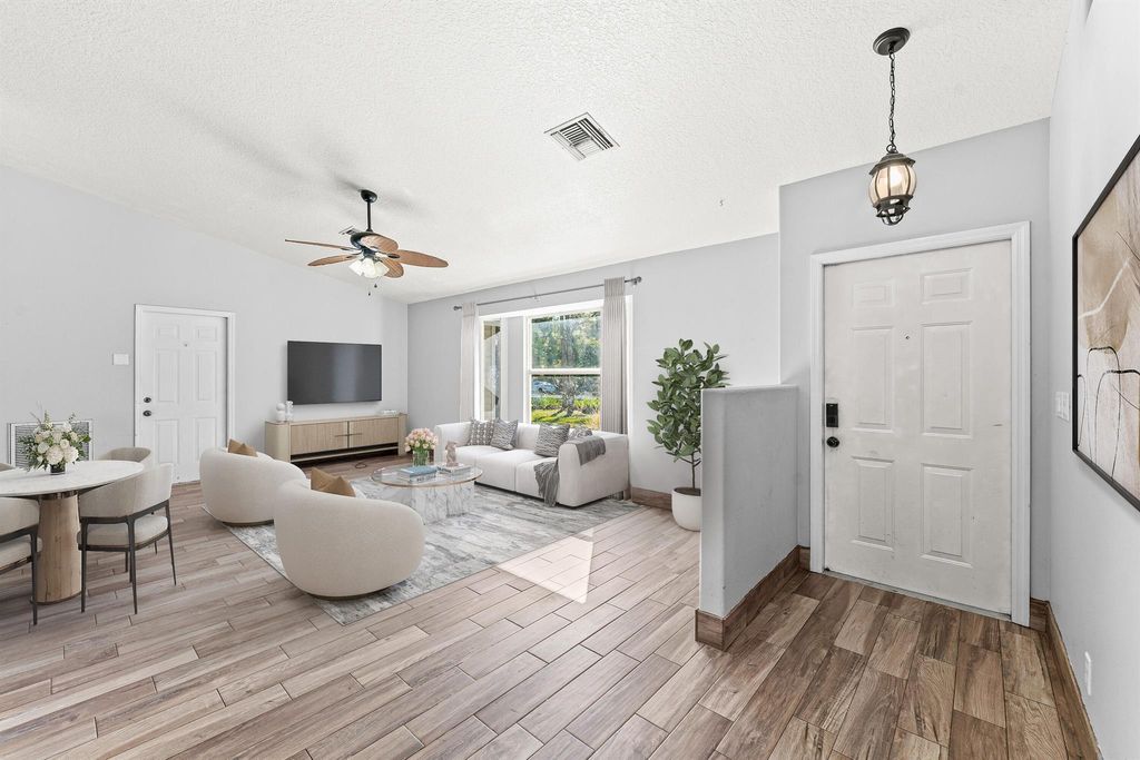 Photo of 13587 76th Road N, The Acreage, FL 33412 (MLS # R11143584)