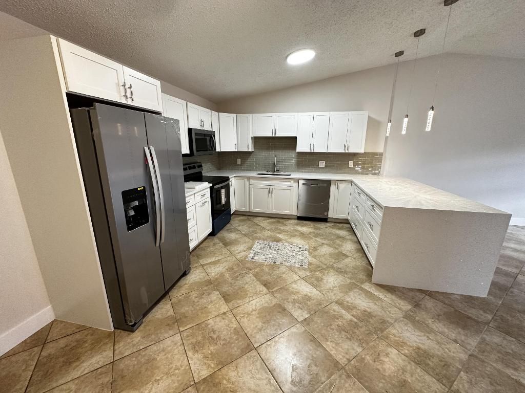 Photo of 4326 Woodstock Drive #C, West Palm Beach, FL 33409 (MLS # R11158934)