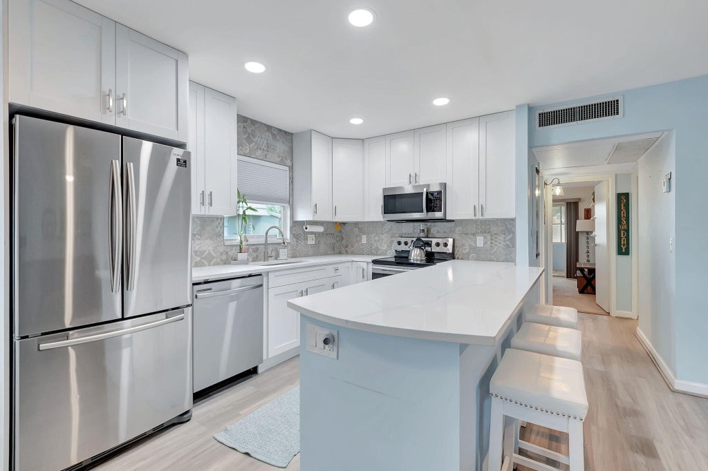 Photo of 89 Flanders Way #B, Delray Beach, FL 33484 (MLS # B26017056)