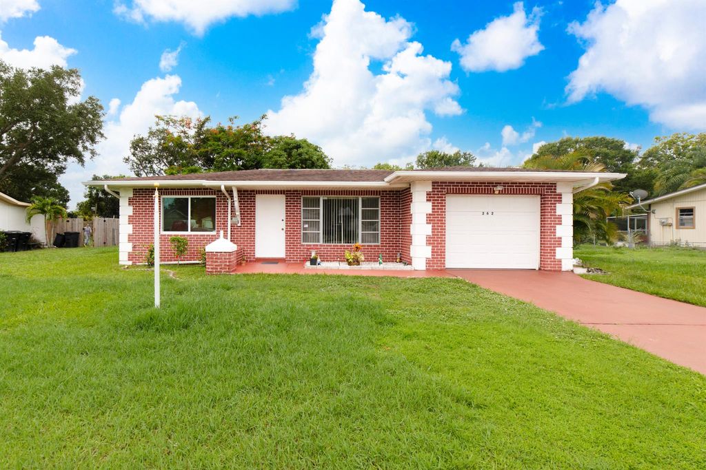 Photo of 262 SW Lucero Drive, Port Saint Lucie, FL 34983 (MLS # R11000590)