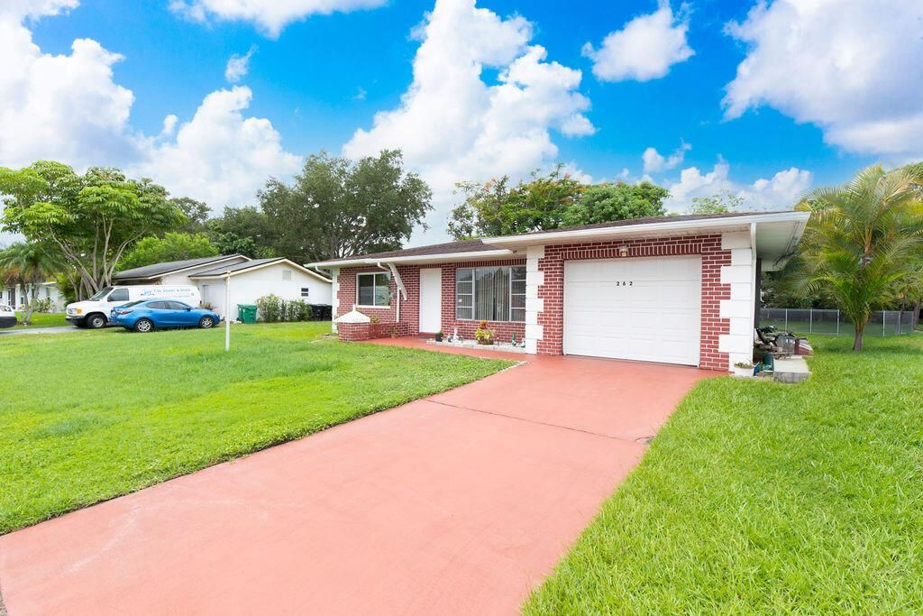 Photo of 262 SW Lucero Drive, Port Saint Lucie, FL 34983 (MLS # R11000590)