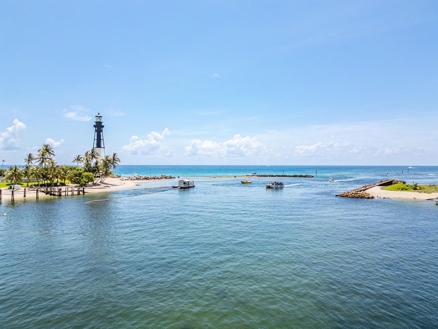 First Floor unit with Spectacular Waterfront Views of Hillsboro Lighthouse / Inlet & Atlantic Ocean! Stunning Balcony Sunsets on private porch. Private Sandy Beach access.1 block to water taxi, charter fishing/scuba/snorkling fleets & restaurants. Community pools, shuffle board, laundry facilities. Thoughtfully-designed 1,142-sq. foot layout w/ open-concept living area. Natural light flows into kitchen/dining space. This space is perfect for relaxing evenings and entertaining. Fully-equipped kitchen includes all necessary appliances, essential cookware, utensils. Choose between a large countertop with barstools where you can share morning coffee or casual meals or go alfresco on the waterfront patio. King master w/ panoramic water views. All utilities included except cable and internet.