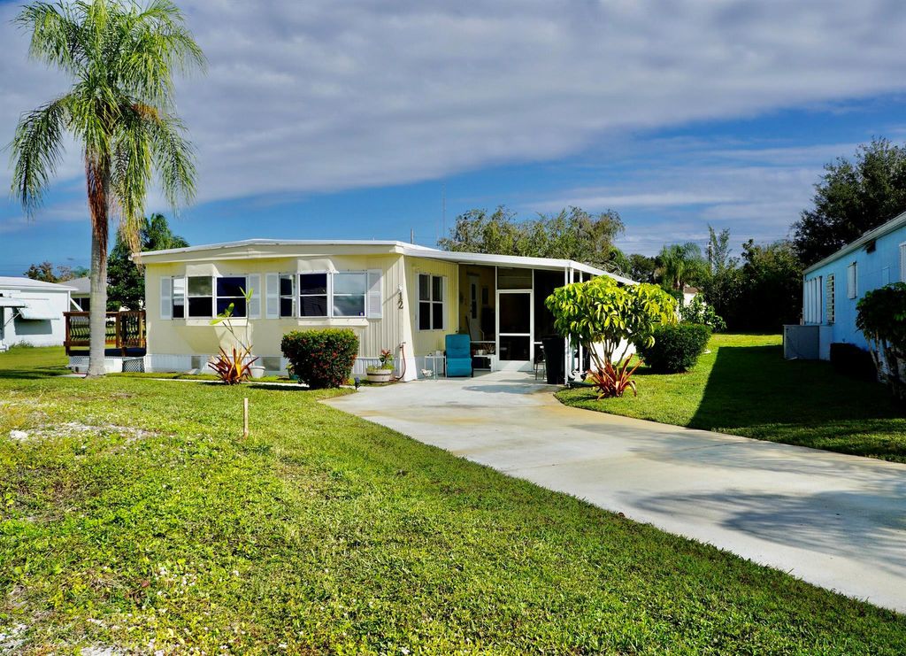 Photo of 12 Nuestra Calle Lane, Port Saint Lucie, FL 34952 (MLS # R11142471)