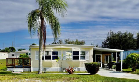 Photo of 12 Nuestra Calle Lane, Port Saint Lucie, FL 34952 (MLS # R11142471)