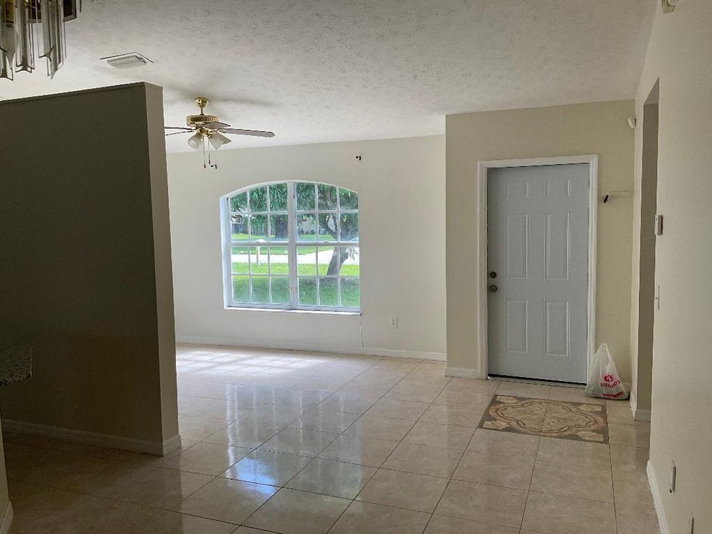 Photo of 5252 NW Gamma Street, Port Saint Lucie, FL 34986 (MLS # R11103980)