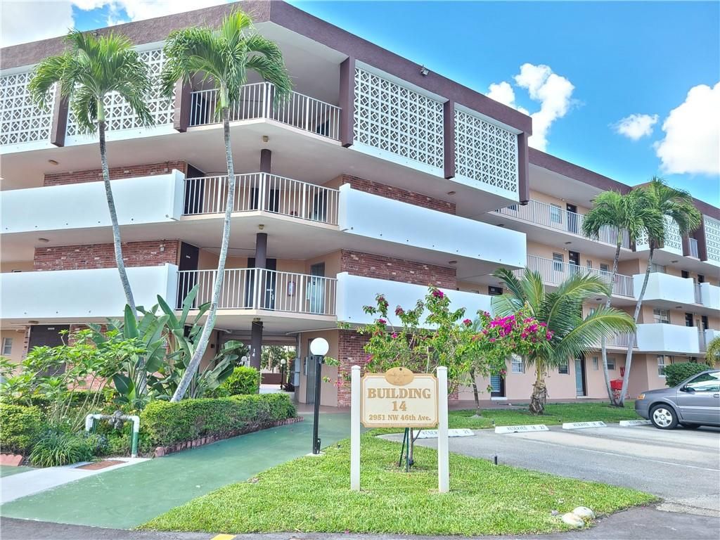 Photo of 2951 NW 46th Ave #101, Lauderdale Lakes, FL 33313 (MLS # F10373346)