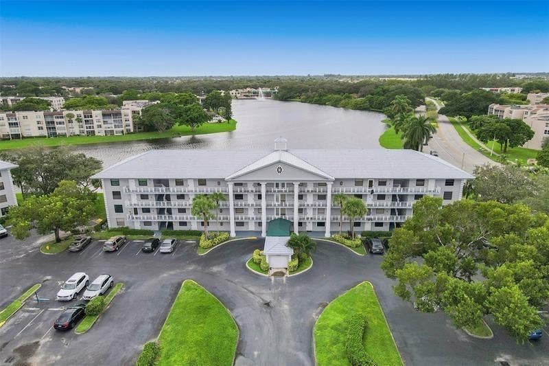 Photo of 1520 WHITEHALL Drive #202, Davie, FL 33324 (MLS # B26065418)