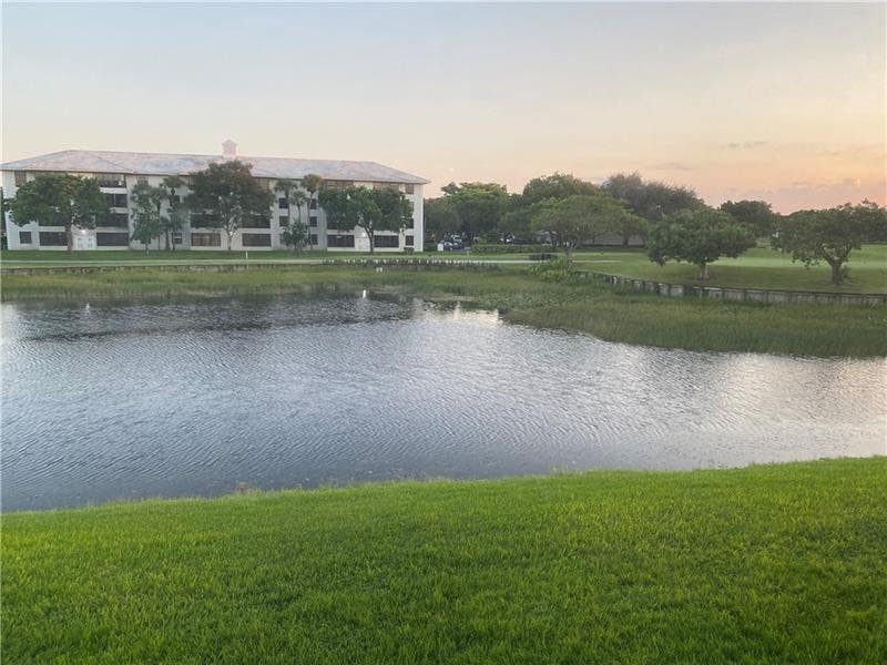 Photo of 1520 WHITEHALL Drive #202, Davie, FL 33324 (MLS # B26065418)