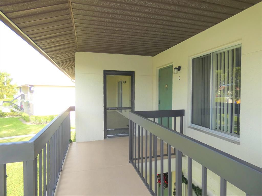 Photo of 6495 Chasewood Drive #E, Jupiter, FL 33458 (MLS # R10680016)