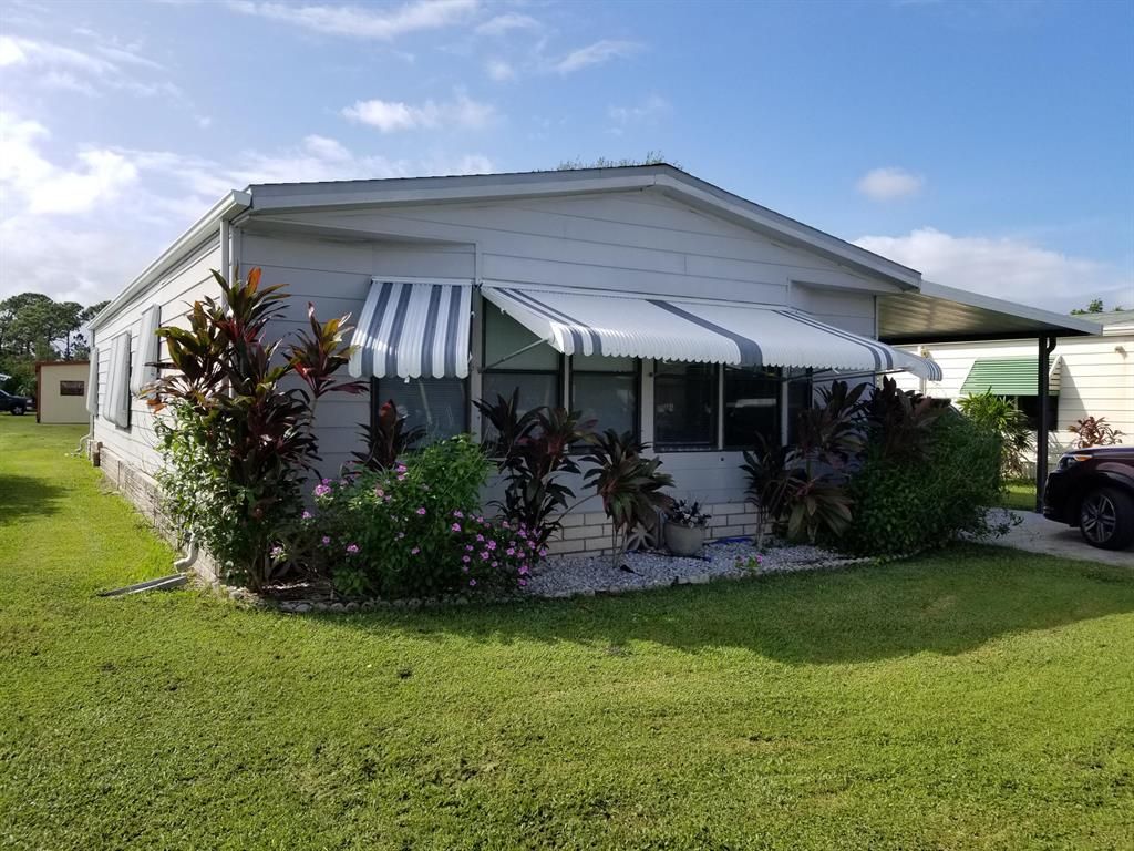 Photo of 531 Barb Ann Lane, Port Saint Lucie, FL 34952 (MLS # R10561566)