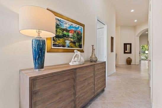 Photo of 7502 ORCHID HAMMOCK Drive, West Palm Beach, FL 33412 (MLS # B26063636)