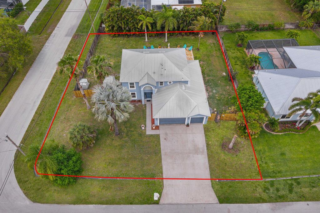 Photo of 1597 SW Herder Road, Port Saint Lucie, FL 34953 (MLS # R11068222)
