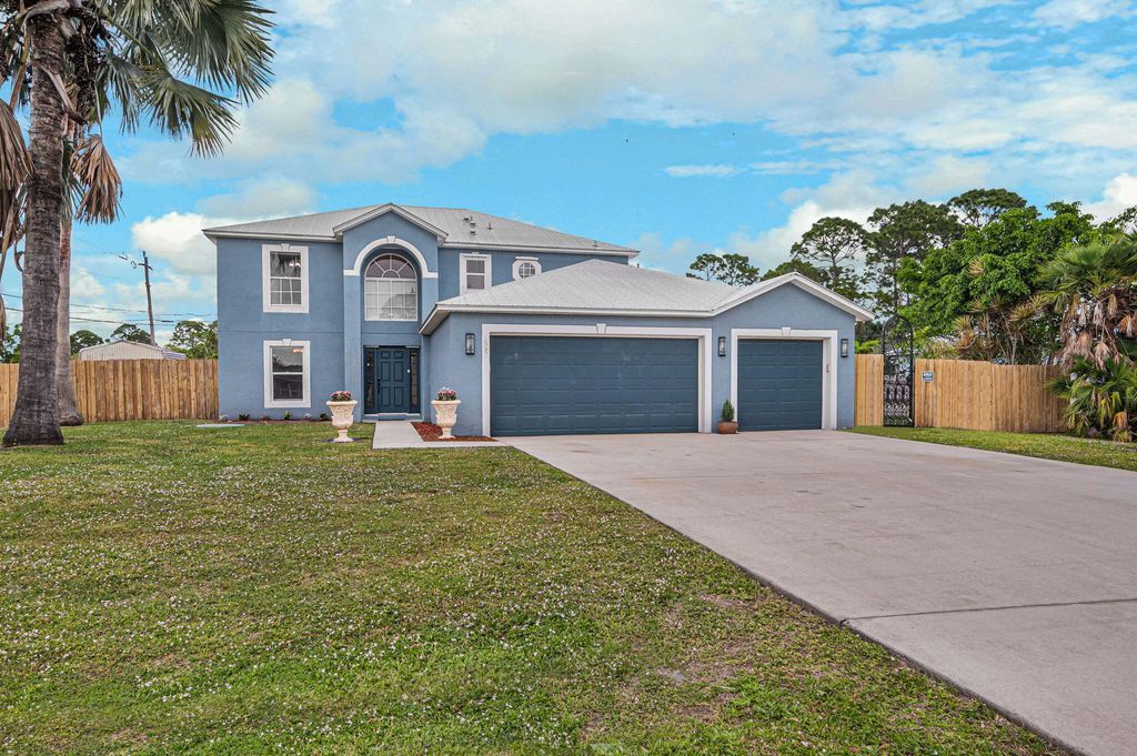 Photo of 1597 SW Herder Road, Port Saint Lucie, FL 34953 (MLS # R11068222)