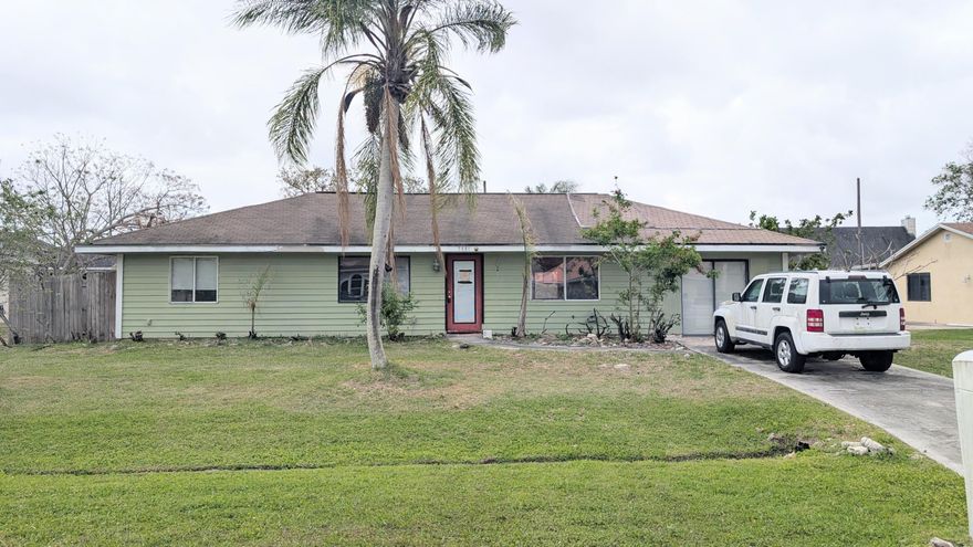 Opportunity awaits in this 3-bedroom, 2-bath home located in the heart of Port St. Lucie! Situated on a generously sized lot, this property offers a large backyard with plenty of room to create your own outdoor oasis, add a pool, or expand.  This home is perfect for investors or buyers looking to customize and add value. While it does need some work, key components include an HVAC system (2014), water heater (2012), and a shingle roof (2005)—providing a solid starting point for renovations Conveniently located near major roadways including US-1 and the Florida Turnpike, making commuting a breeze. Enjoy close proximity to shopping, dining, and everyday conveniences, as well as just a short drive to the beautiful beaches of Jensen Beach and outdoor recreation at Savannas Preserve State Park. This property is eligible under the First Look Initiative.  All Owner Occupant offers will be responded to after 7 days on the market and Investor offers will be responded to after 30 days. However, all offers can be submitted during the First Look period.