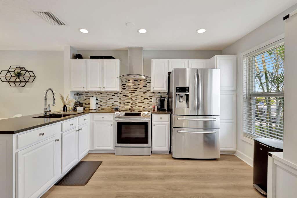 Photo of 143 Deerfield Drive, Jupiter, FL 33458 (MLS # R10975668)