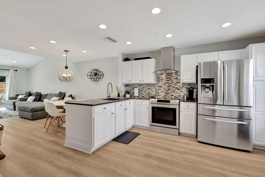 Photo of 143 Deerfield Drive, Jupiter, FL 33458 (MLS # R10975668)