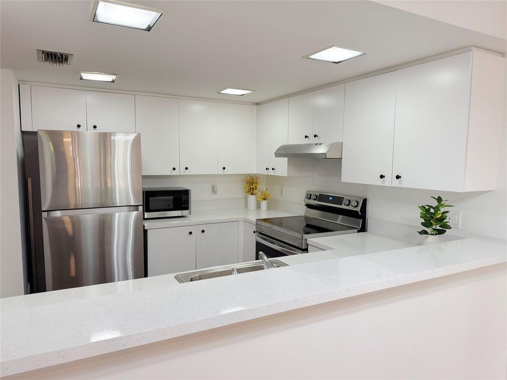 Photo of 4428 SW 70th Terrace #4428, Davie, FL 33314 (MLS # F10496608)