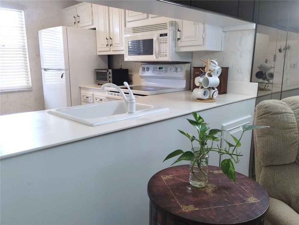 Photo of 2601 Nassau Bend #E1, Coconut Creek, FL 33066 (MLS # F10534928)