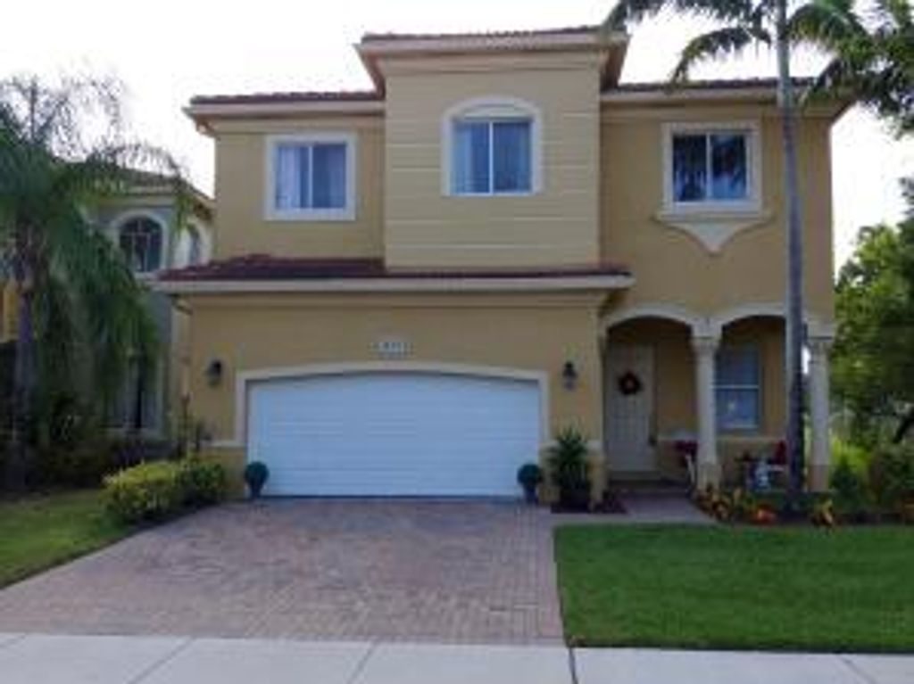 Photo of 673 Gazetta Way, West Palm Beach, FL 33413 (MLS # R11103649)
