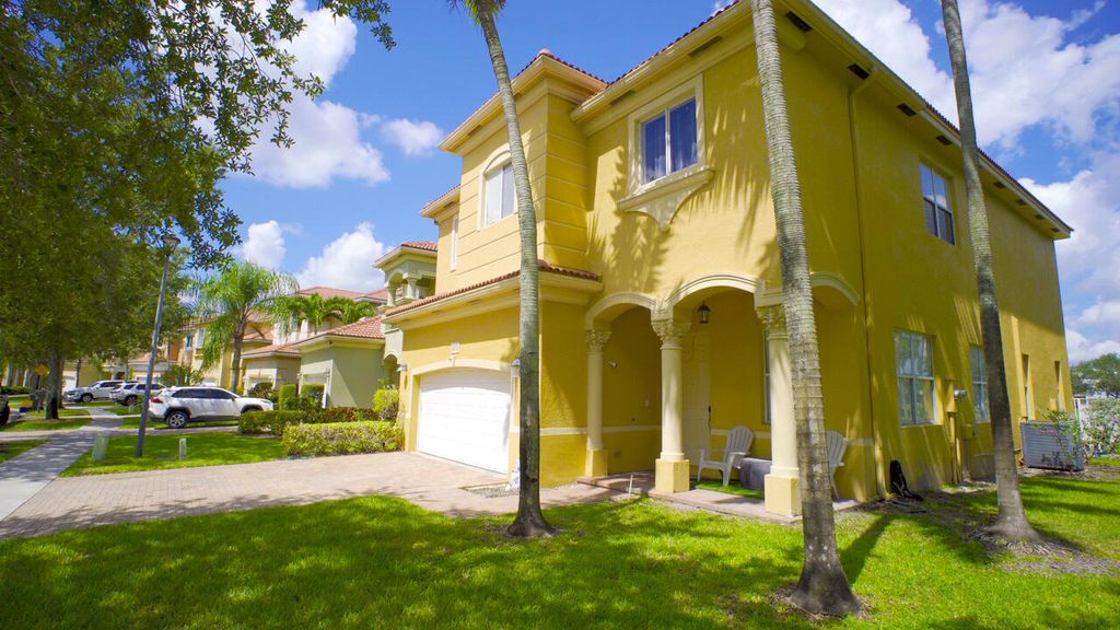 Photo of 673 Gazetta Way, West Palm Beach, FL 33413 (MLS # R11103649)