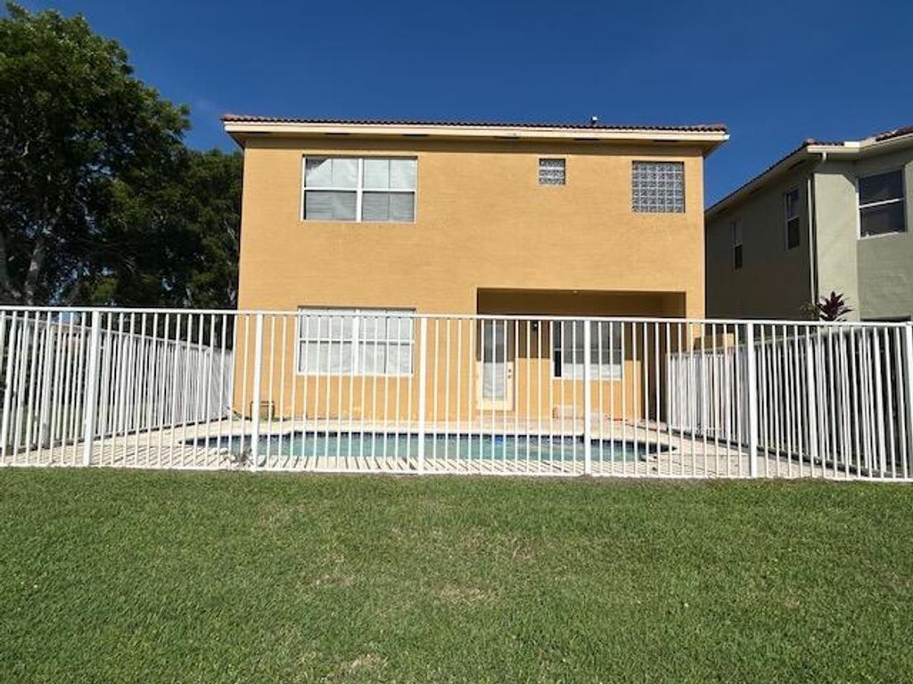 Photo of 673 Gazetta Way, West Palm Beach, FL 33413 (MLS # R11103649)